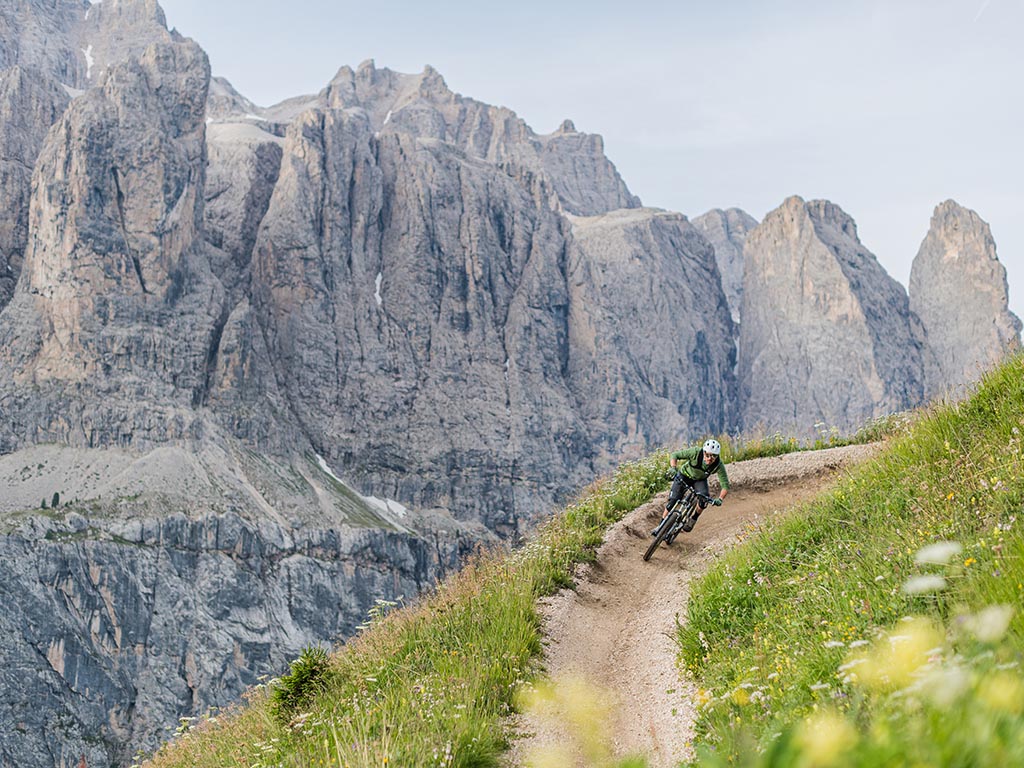 Mountain biking on the Gardena Pass in Selva in Val Gardena, Dolomites in South Tyrol