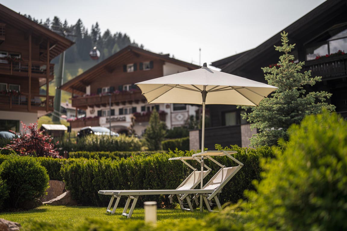 Garden of the Garni Hotel Arya Alpine Lodge in the Dolomites, Italy 