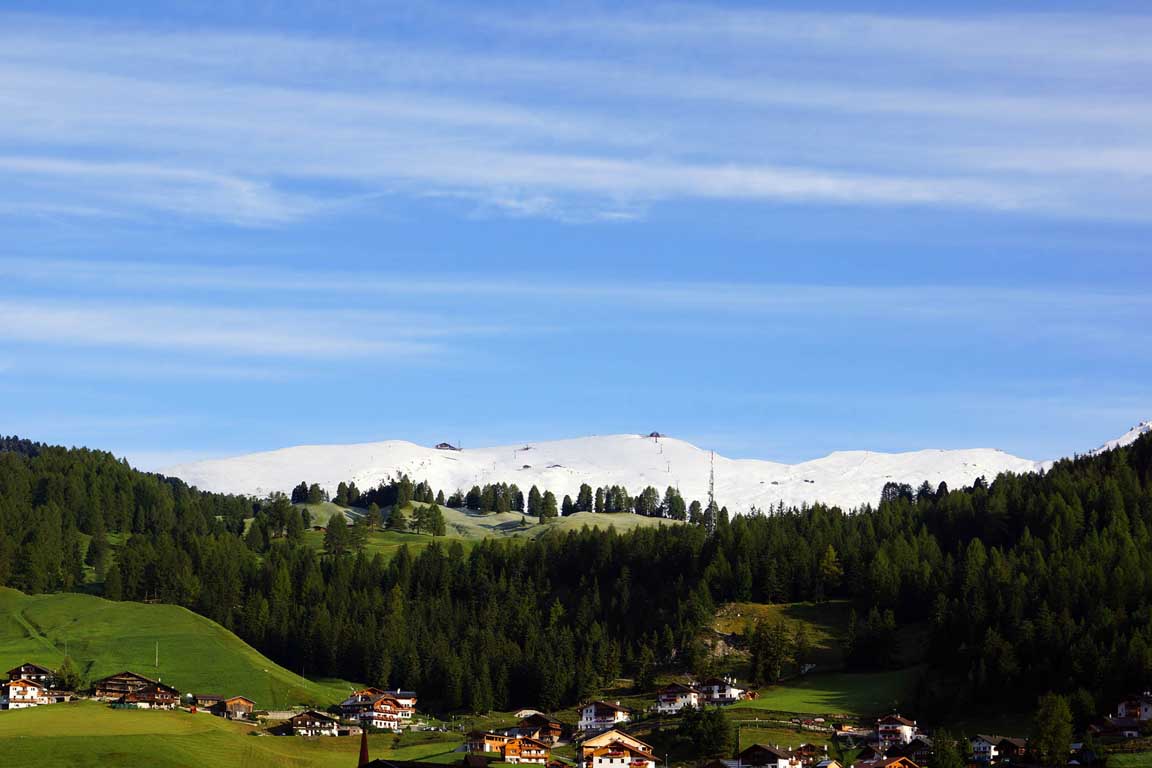 Snow-capped Seceda Dolomites in september