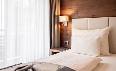 Rooms and Suites in the Garni Hotel Arya Alpine Lodge